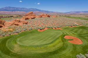 View of home's community featuring a mountain view and golf course view