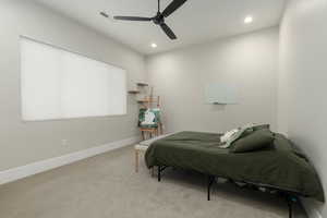 Bedroom with baseboards, recessed lighting, visible vents, and light colored carpet