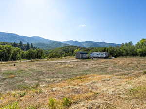 Property view of mountains featuring a rural view