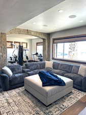 Living area with a textured ceiling and wood finished floors