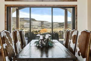 Dining space featuring a mountain view