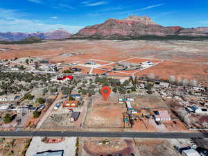 Birds eye view of property with a mountain view