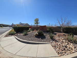 View of yard featuring fence