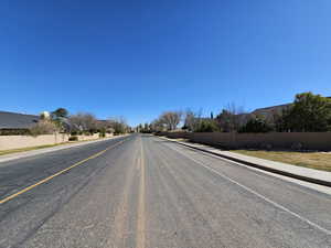 View of road featuring curbs and sidewalks