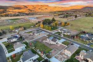 Birds eye view of property featuring a residential view and a mountain view