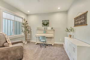 Office area featuring recessed lighting, light colored carpet, and baseboards