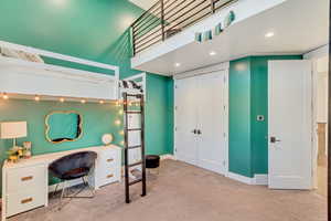 Bedroom featuring recessed lighting, light colored carpet, and baseboards