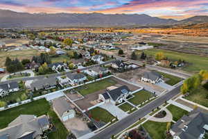 Drone / aerial view with a residential view and a mountain view