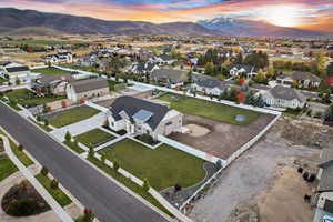 Drone / aerial view with a residential view and a mountain view