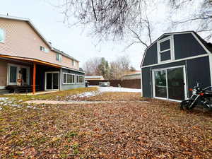 View of yard with a patio area and fence