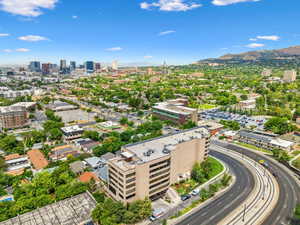 Aerial view with a view of city and a mountain view