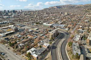 Aerial view with a view of city and a mountain view