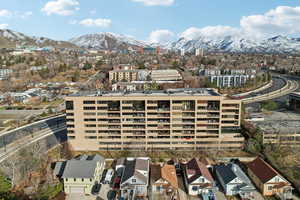 Birds eye view of property with a mountain view