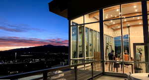 View of balcony at dusk