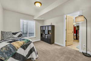 Bedroom 4 featuring light carpet and Jack and Jill bathroom