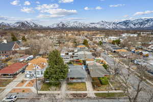 Birds eye view of property featuring a residential view and a mountain view