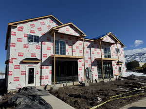 Property in mid-construction with a mountain view