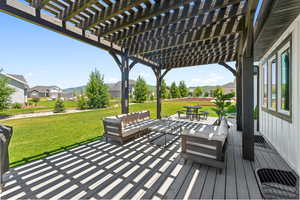 View of patio / terrace with outdoor dining space, a residential view, an outdoor hangout area, and a pergola