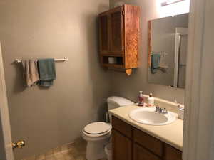 Bathroom with vanity and toilet