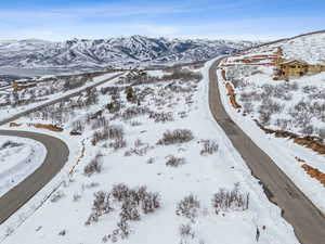 Snowy aerial view with a mountain view
