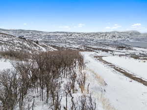 Snowy aerial view with a mountain view