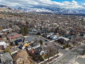 Birds eye view of property featuring a residential view and a mountain view