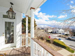 Balcony with a residential view and a mountain view