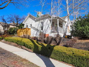 View of home's exterior featuring fence