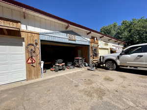 Garage featuring driveway