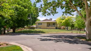 View of front of property featuring a front lawn