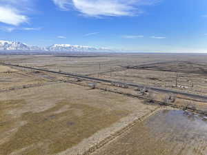 Drone / aerial view featuring a mountain view and a rural view