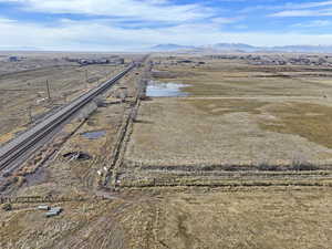 Birds eye view of property featuring a rural view and a mountain view