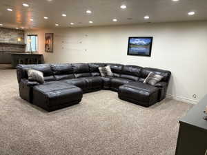 Living room featuring recessed lighting, carpet flooring, and baseboards