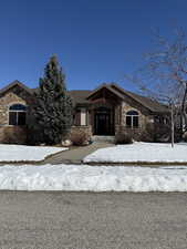 View of front of property with stone siding