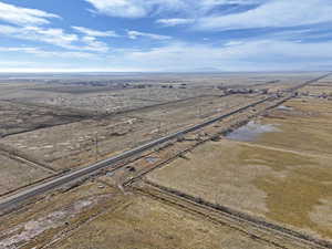 Birds eye view of property with a rural view