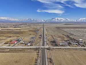 Birds eye view of property with a mountain view