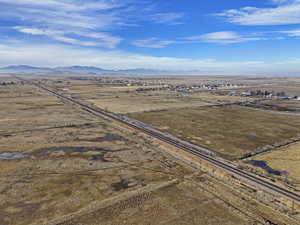 Drone / aerial view featuring a rural view and a mountain view