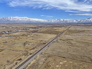 Aerial view featuring a rural view and a mountain view