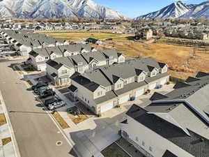 Birds eye view of property featuring a residential view and a mountain view