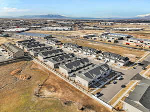 Birds eye view of property featuring a residential view and a mountain view