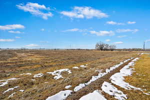 View of yard with a rural view