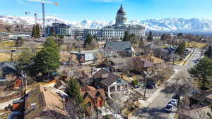 Drone / aerial view of Utah State Capitol and mountains