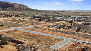 Drone / aerial view with a residential view and a mountain view