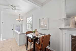 Dining Area, Backyard Entrance, & Stairway to Lower Level