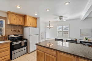 Beautiful Kitchen & Island with Knotty Alder Cabinets & Granite Countertops