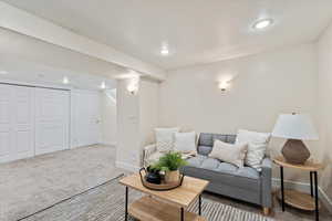 Carpeted Family room featuring recessed lighting