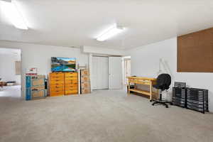 Interior space featuring a textured ceiling