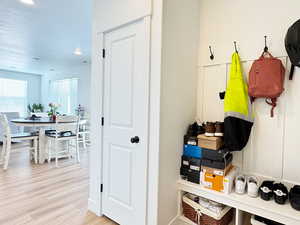 Mudroom with wood finished floors