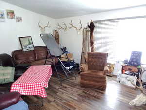 Living area featuring wood finished floors