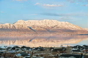 Mountain view featuring a water view and a residential view